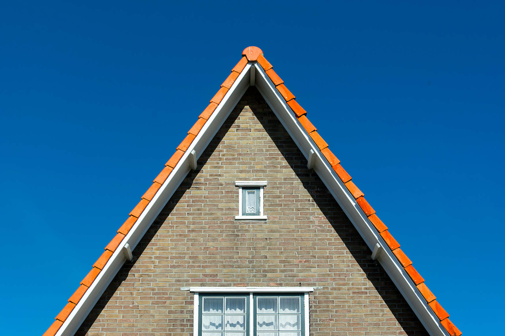 Exterior of a finished hip-to-gable loft conversion.